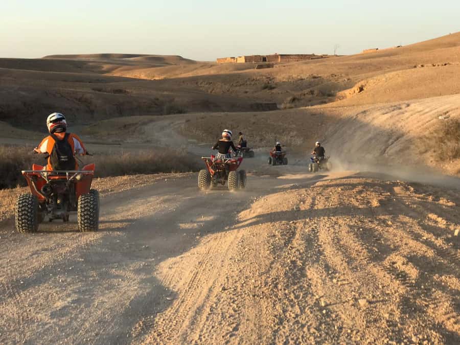 Marrakesh: Agafay Desert Quad & Camel Tour with Dinner - Camel riding in nomadic dress