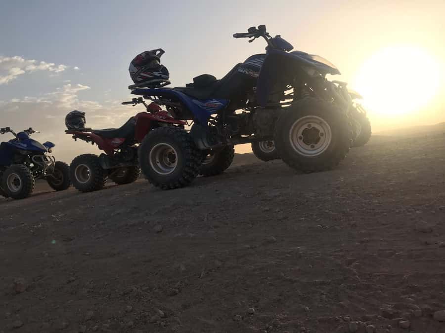 Marrakesh: Agafay Desert Quad & Camel Tour with Dinner - Quad biking across rocky tracks