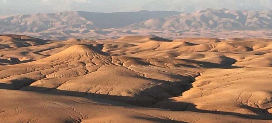 Marrakesh: Agafay Desert Tour with Lunch and Swimming Pool - Reaching the desert camp and pool