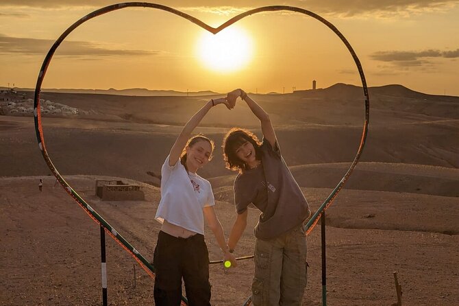 Marrakesh: Sunset Dinner in Agafay Desert with Show & Transfers - Agafay at sunset, with Atlas views in the distance