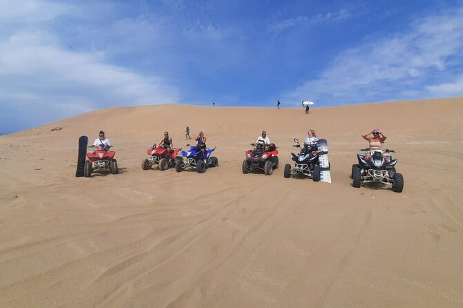 Quad Bike and Sandboarding on Sand Dunes Wild Beach - The Berber village stop adds local context