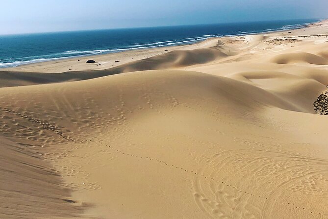Quad Biking and Sandboarding on Sand Dunes Wild Beach - Safety briefing and quad-bike setup