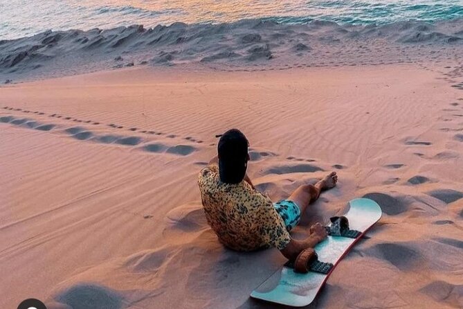 Sandboarding with Panoramic Views of the ocean and Agadir Desert - The ride down, and the walk back up