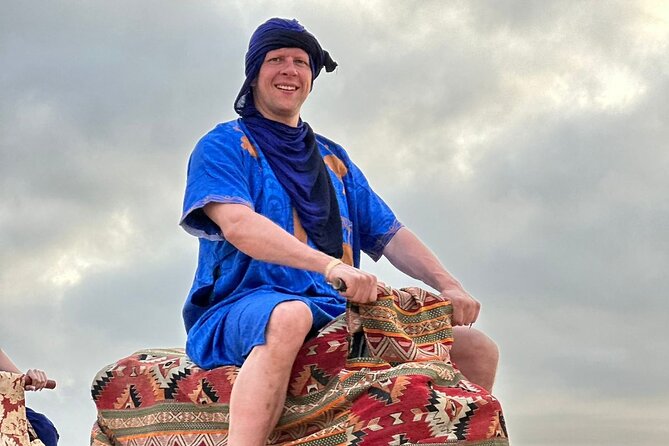 Sunset Camel Ride tour with Barbecue dinner in the beach - Choosing your camel at the ranch