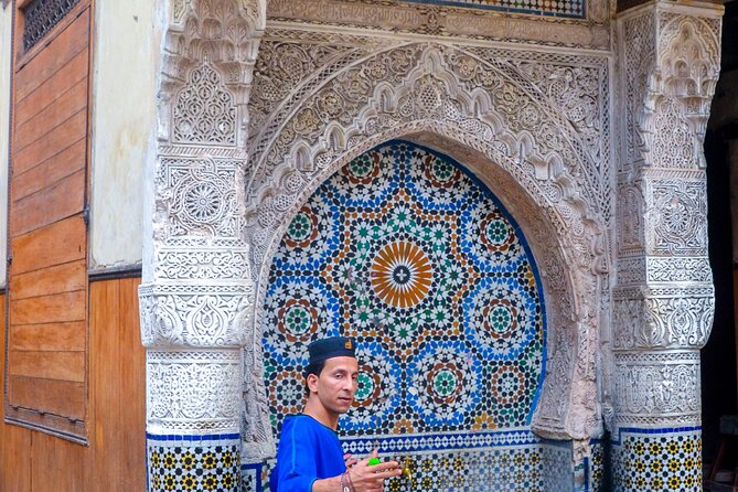 Tour guide in the old city of Fez - The Royal Palace gates in Fez